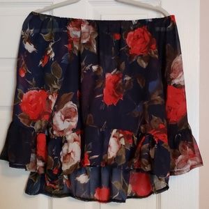 Navy and red floral top.